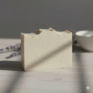 A minimalist, handcrafted bar of natural soap for sensitive skin showing a smooth, creamy texture.