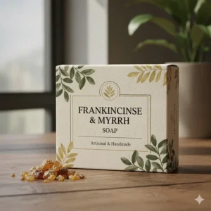 The beautifully designed, eco-friendly box packaging for the frankincense and myrrh soap, emphasizing its handmade, artisanal nature.