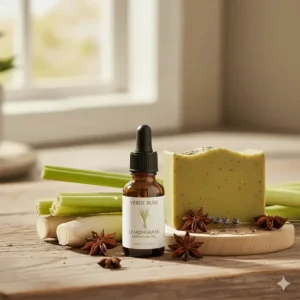A small bottle of pure lemongrass essential oil, highlighting the natural fragrance component of the finished soap.