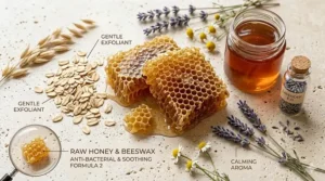 Flat lay illustration of raw honeycomb, oats, and essential oils used in honey soap for sensitive acne skin.